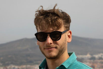 Man outdoors wearing Savona - Black with Green Lens