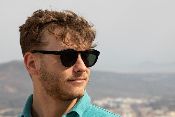 Man wearing Savona - Black with Green Lens